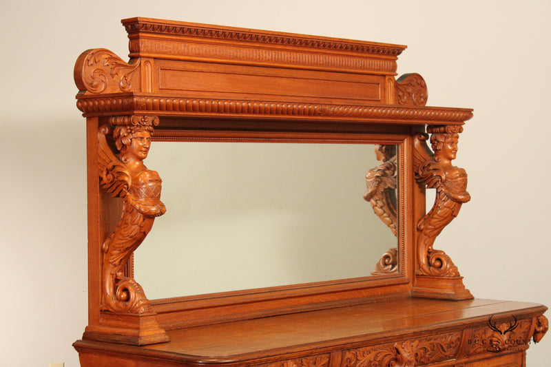 Antique Renaissance Revival Figural Carved Oak Mirrored Sideboard