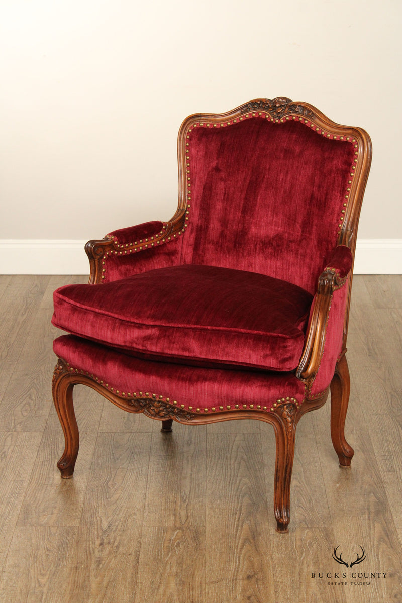 FRENCH LOUIS XV STYLE CARVED WALNUT UPHOLSTERED BERGERE ARMCHAIR