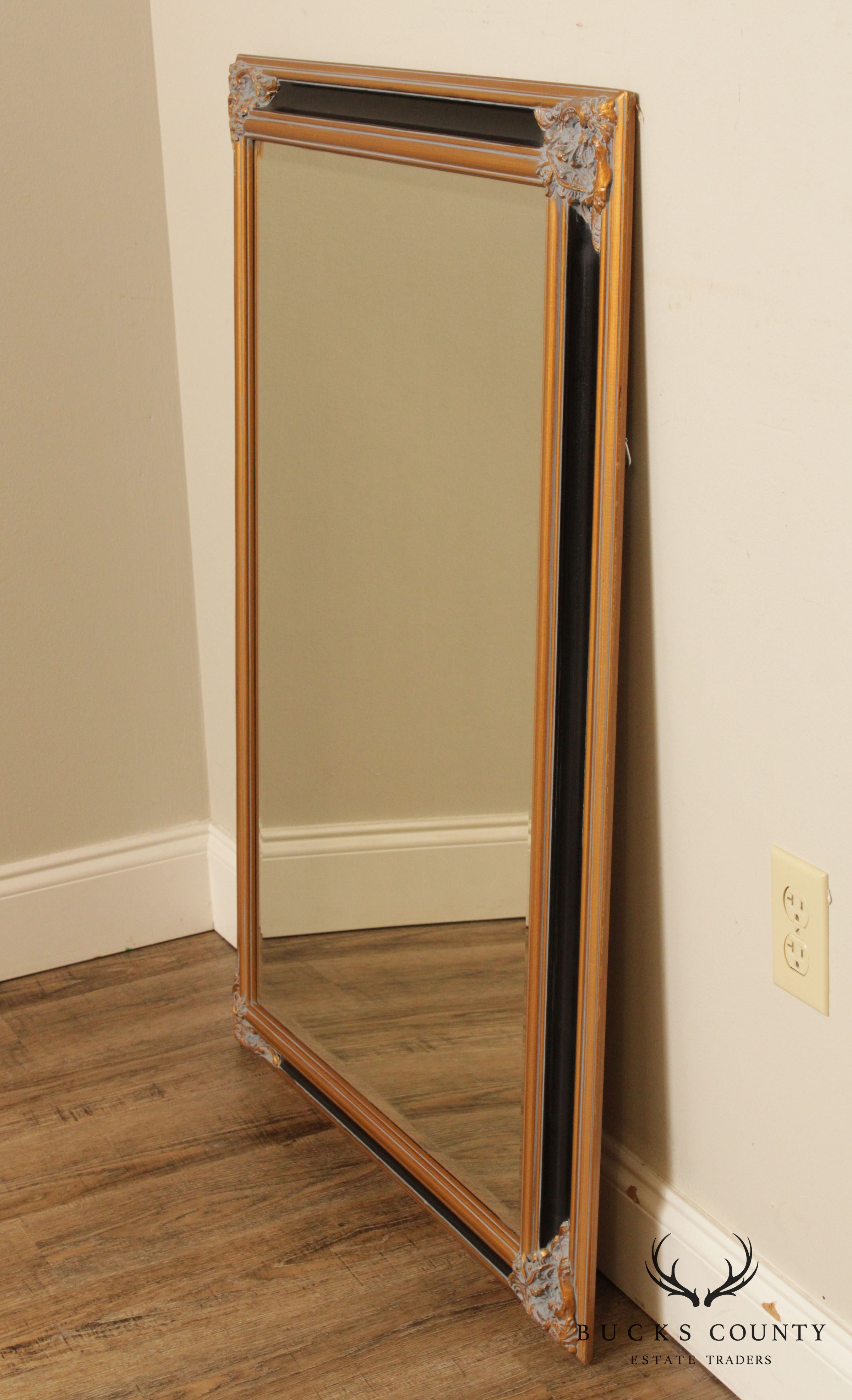 Regency Style Black and Gilt Framed Mirror