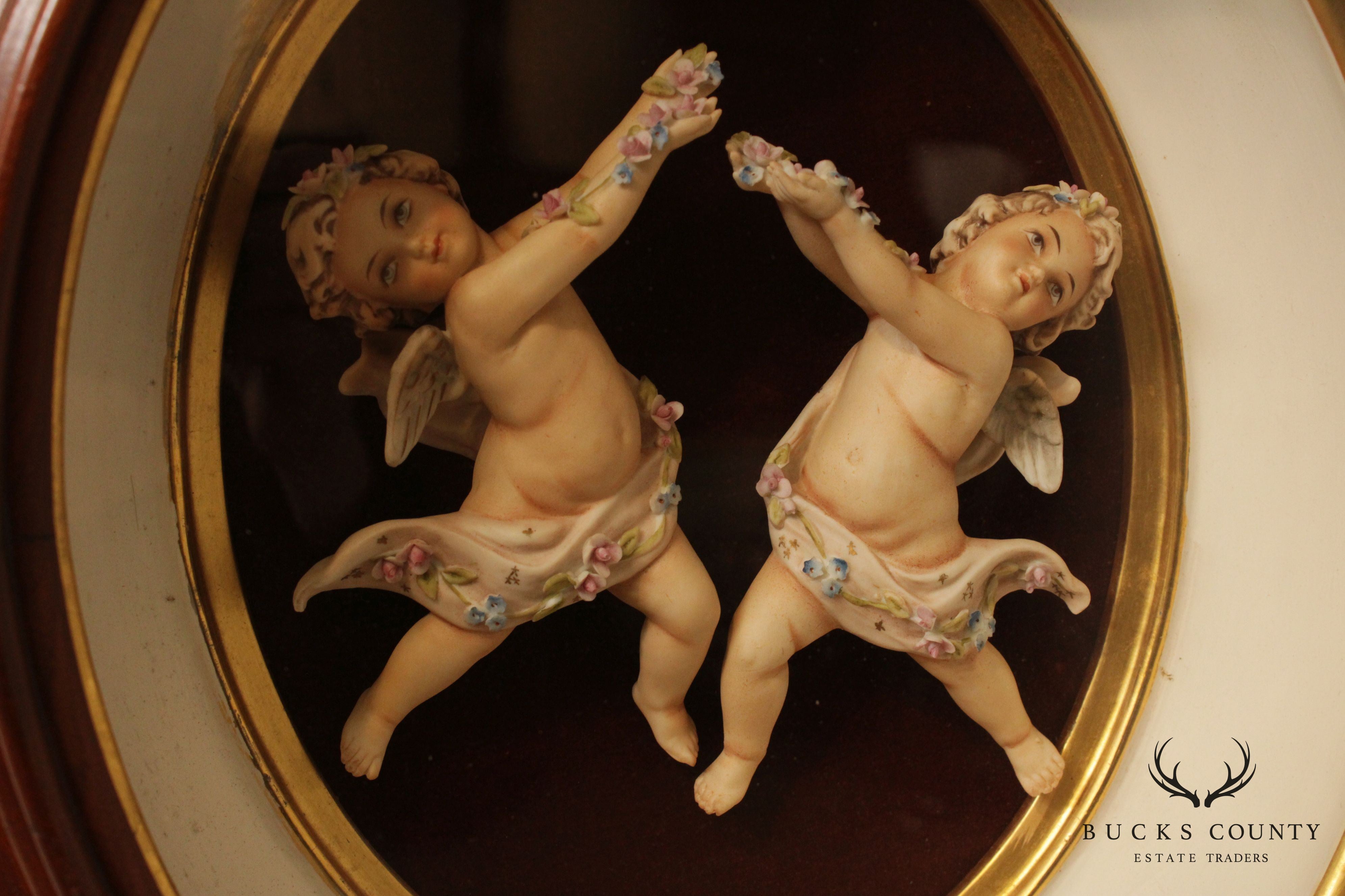 Porcelain Cherub Oval Framed Figurines