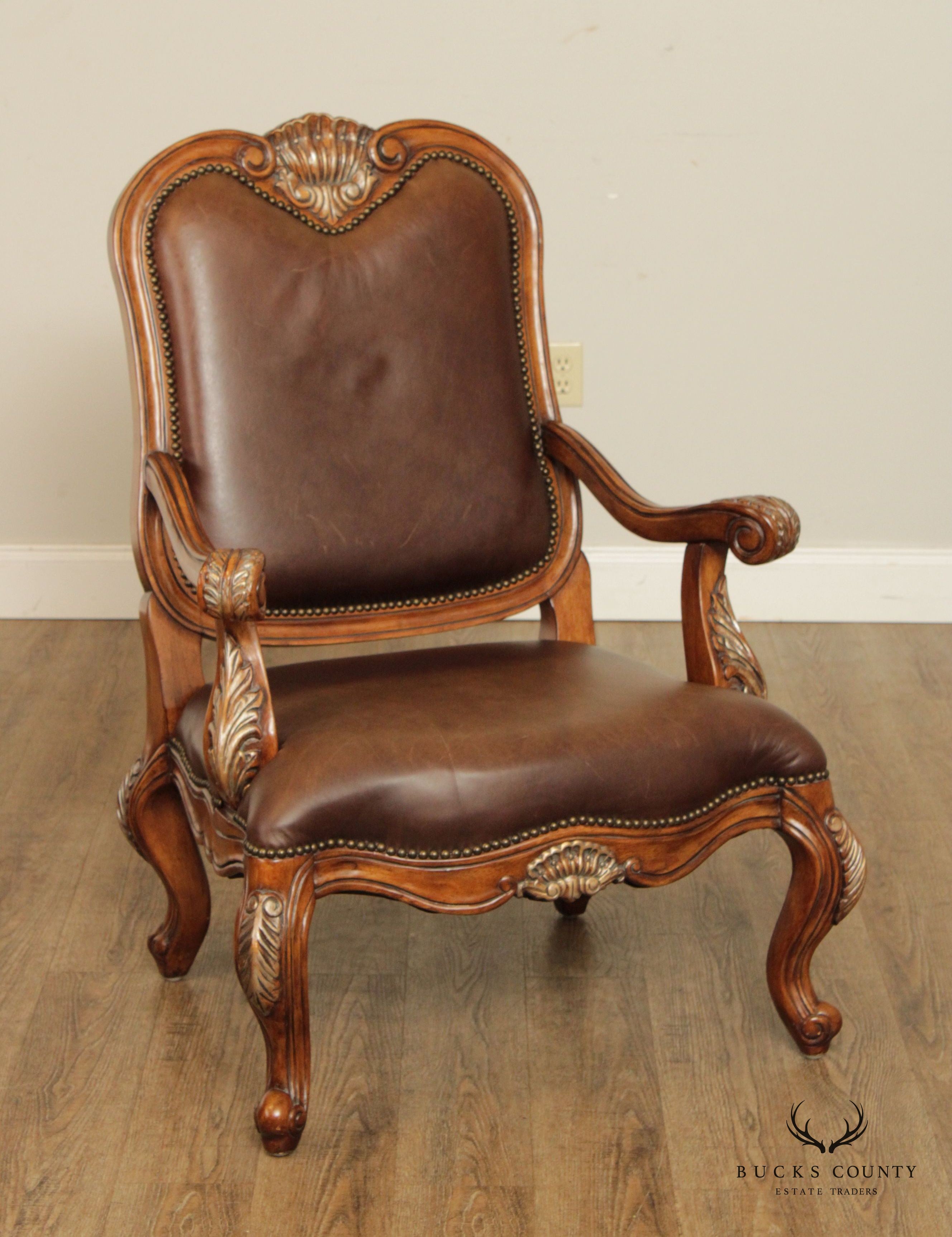 French Provincial Style Pair of Shell-Carved Leather Armchairs and Ottomans