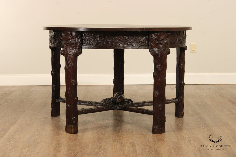 Antique American Black Forest Style Carved Oak Round Dining Table