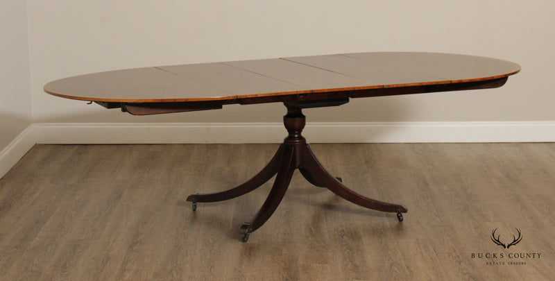 Baker Regency Style Vintage Expandable Mahogany Pedestal Dining Table