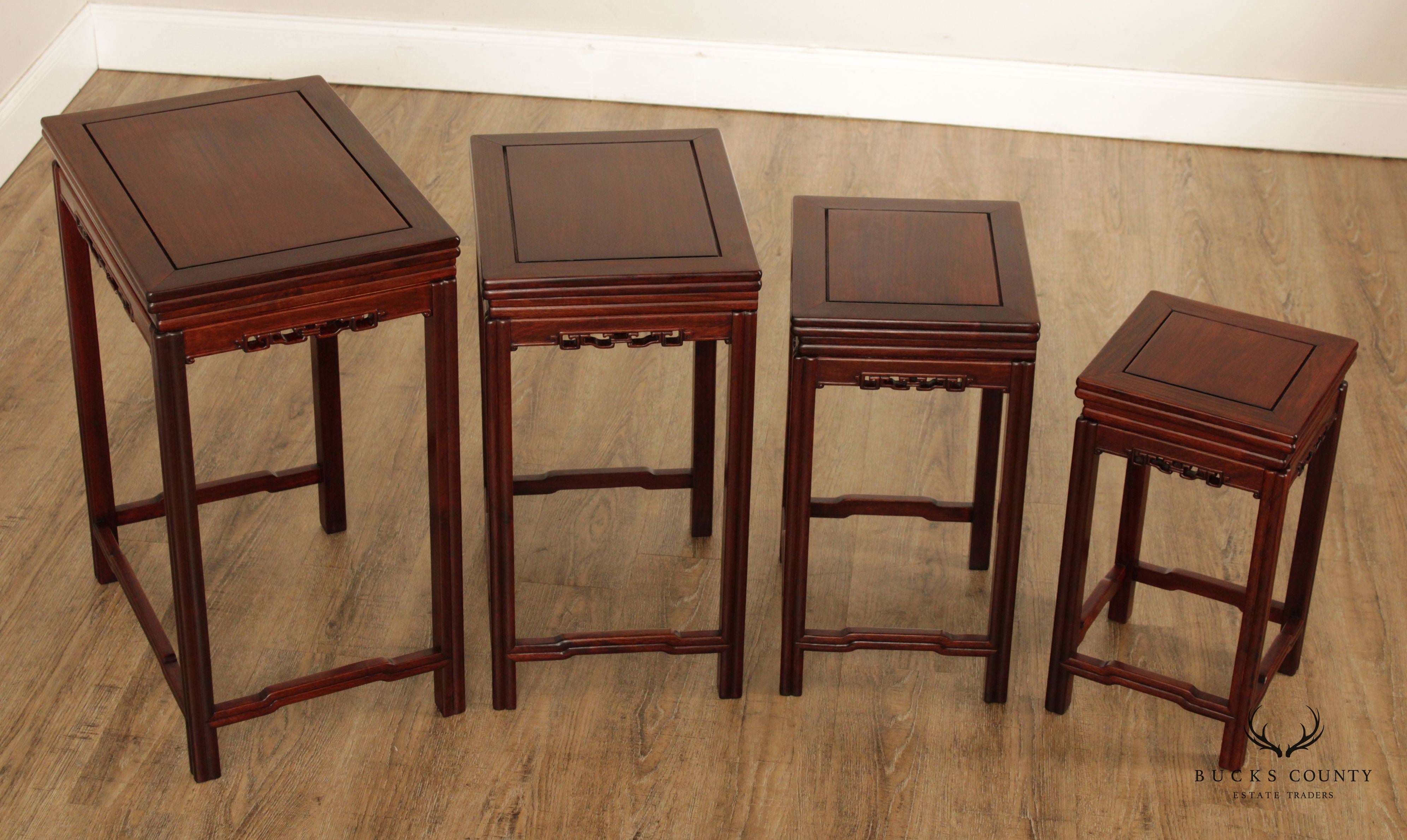 Chinese Set of Four Carved Hardwood Nesting Tables