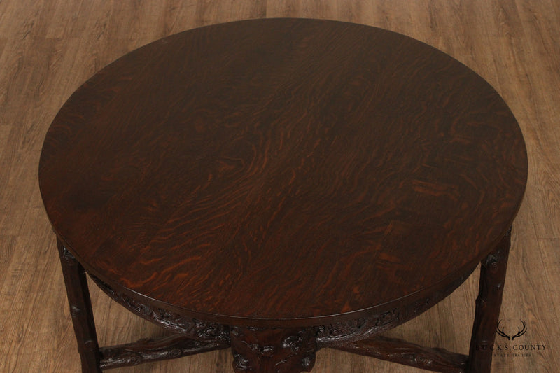 Antique American Black Forest Style Carved Oak Round Dining Table